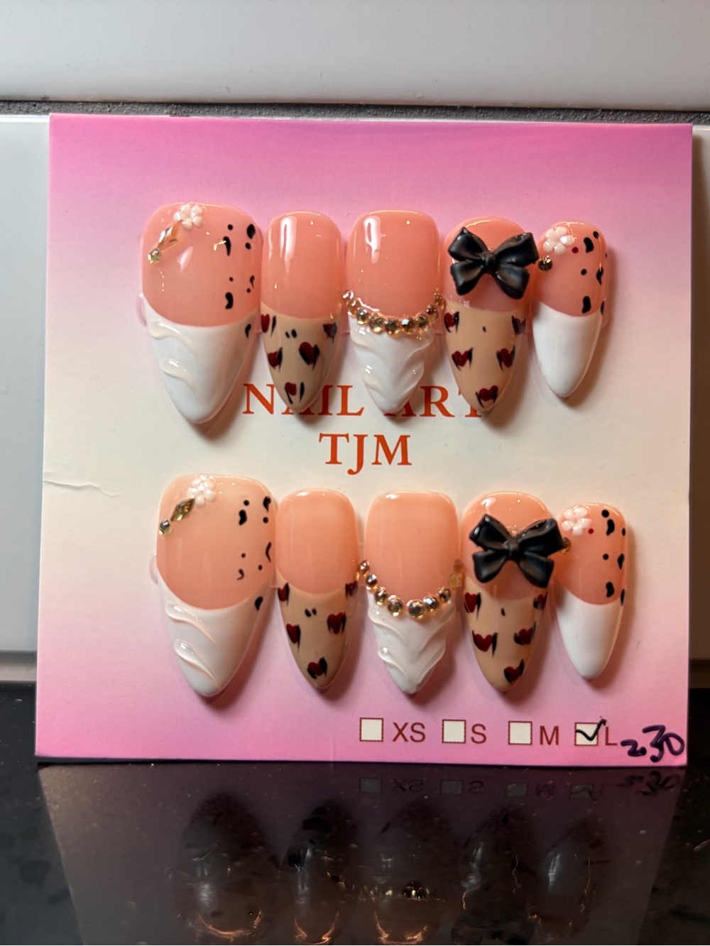 Almond shape press ons-bow cheetah print